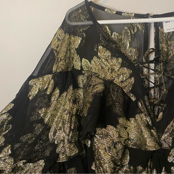 ASOS DESIGN Curve Metallic Frill Mini Dress With Lace Up  Neck In Black Pattern - Picture 6 of 14